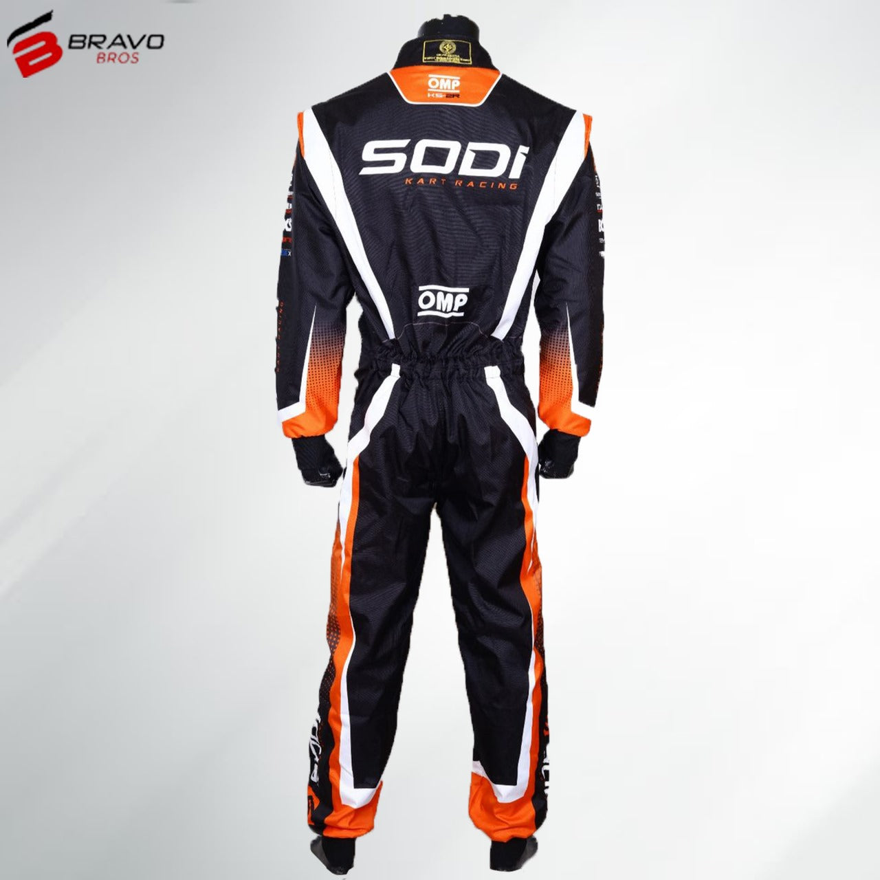 "Close-up of a Sodi Kart go-kart suit in a sleek design featuring the Sodi Kart logo prominently on the chest and shoulders. The suit has a bold color scheme with contrasting panels for an aerodynamic look. It includes reinforced areas for durability and comfort, reflecting the high-performance standards of Sodi Kart’s racing gear."